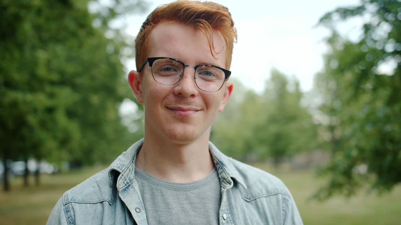 Smiling Young Man in Park