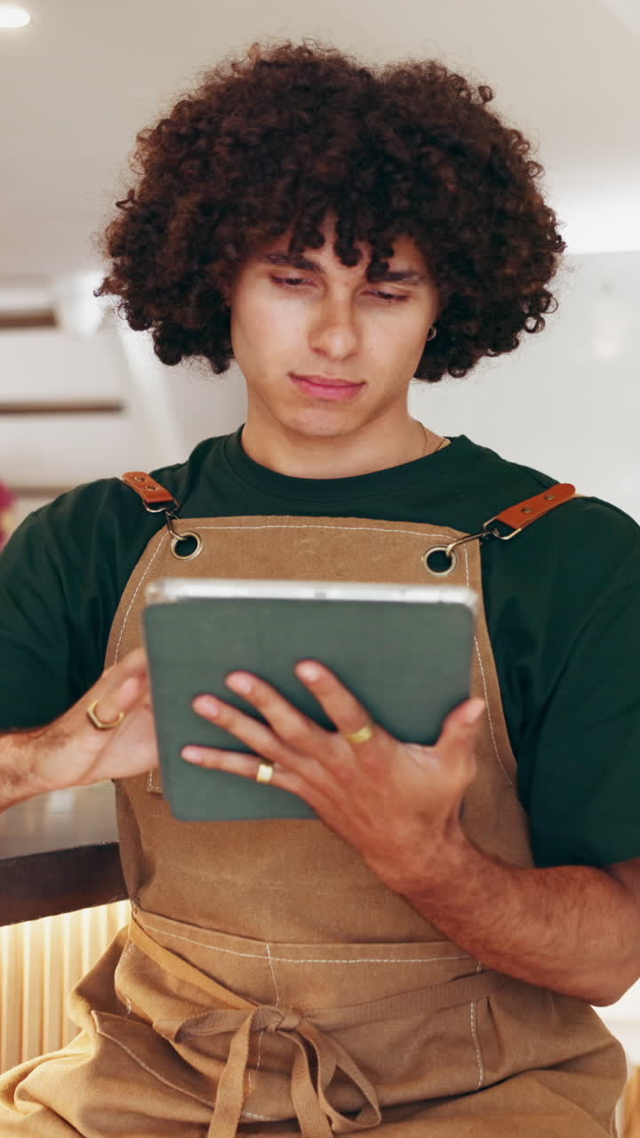 Smiling man wearing apron