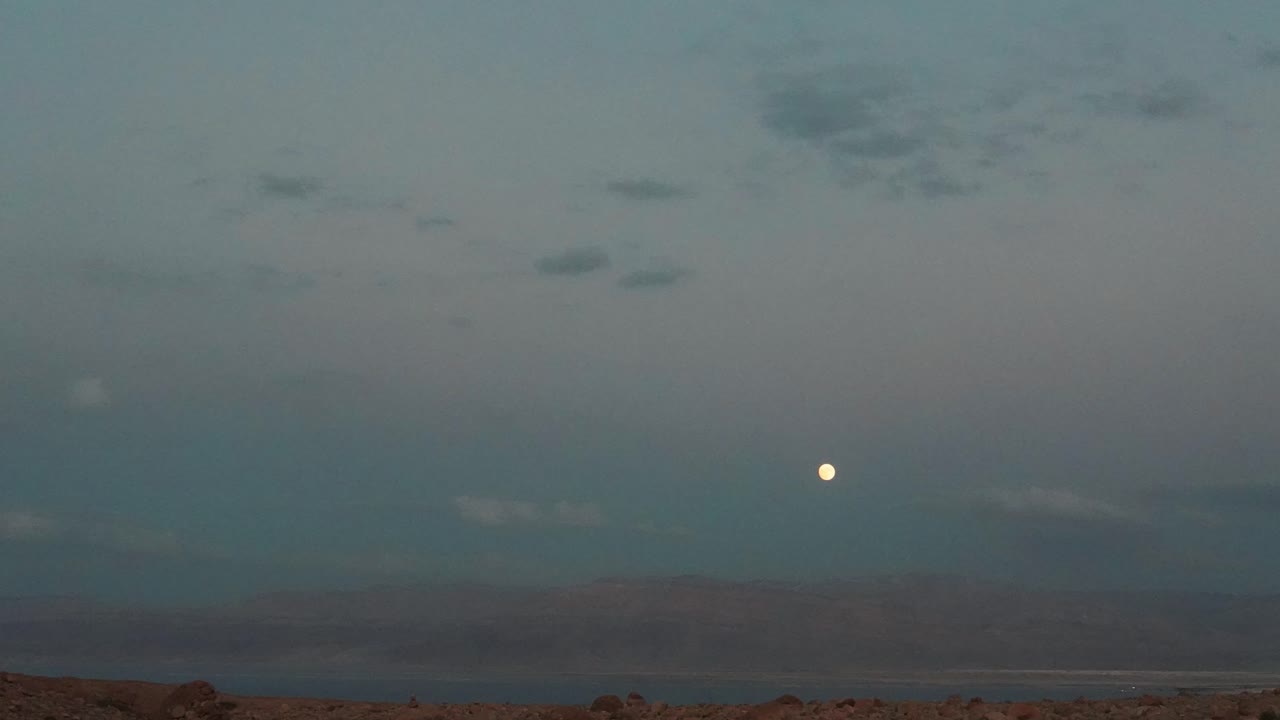 Day to night timelapse of the Dead Sea, Israel side, pointing towards Jordan