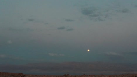 day to night timelapse of the dead sea, israel side, pointing towards jordan