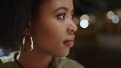 close up portrait of beautiful african american woman looking smiling happy at camera