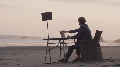 man enjoying sunset after work