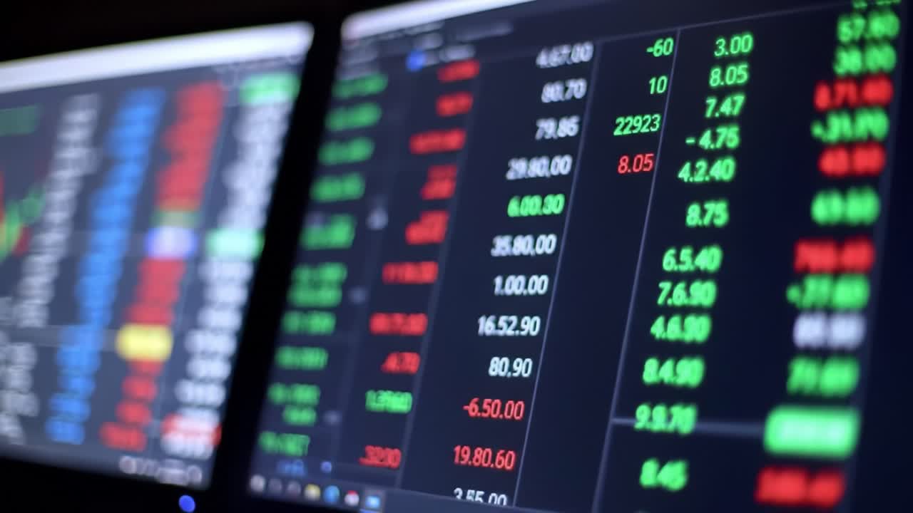 Stock Market Data on Multiple Computer Screens