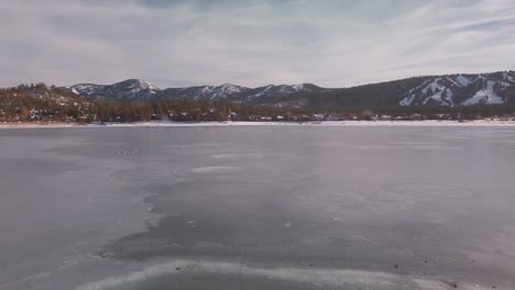 wide panning shot of a frozen lake. 4k