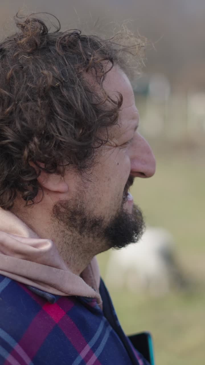 Man with Curly Hair and Beard Profile