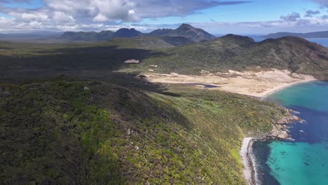 Aerial-view-of-East-Ruggedy-Beach,-sand-dune-and-coastal-scenery-of-Stewart-Island,-New-Zealand