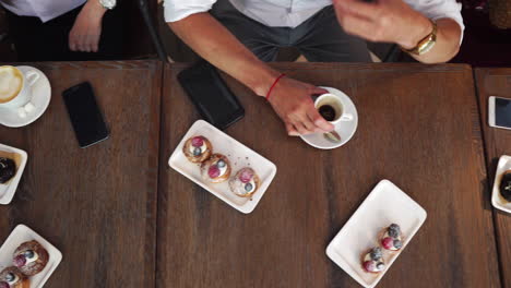 freshly baked blueberry muffins in a rustic setting with milk and coffee on the table overhead shot with copyspace