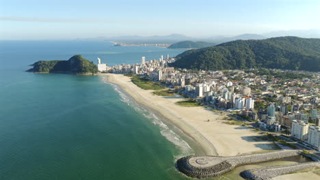 Beautiful aerial coastal scenery of Caiobá sandy beach stretching along the Atlantic Ocean, Matinhos, Paraná, Brazil