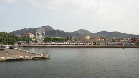 low drone flight over the sea to the port of olbia in sardinia