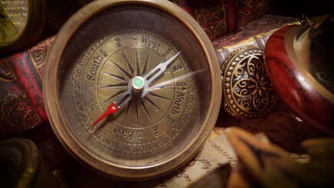 vintage style travel and adventure. vintage old compass and other vintage items on the table.