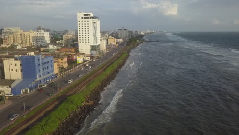 Indian-Ocean-waves-break-onto-rocky-shoreline-in-Colombo-Sri-Lanka