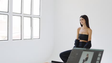 fashion portrait of a woman in a studio