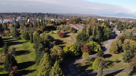 forward drone aerial of vancouver golf course