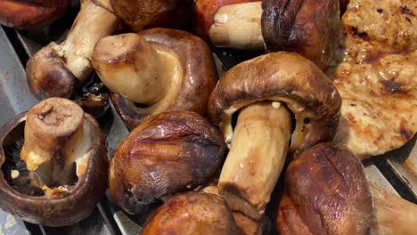 healthy vegetarian barbecue mushrooms closeup slow motion