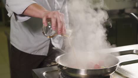 chef preparing food in a kitchen