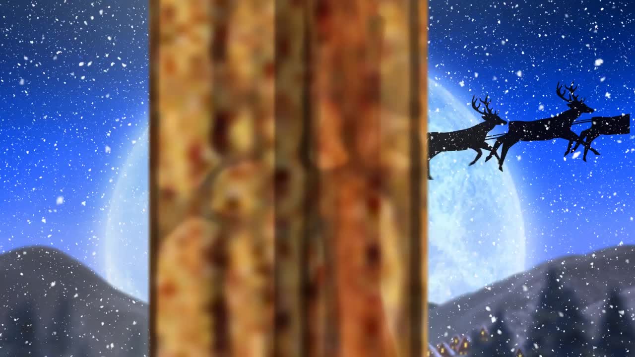 Digital animation of christmas decorations on wooden window against black silhouette of santa claus
