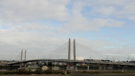 Tilikum Bridge Crossing with trams and buses in Portland Oregon USA in 4k High Resolution
