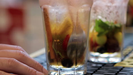 bartender stirring cocktail , slow motion