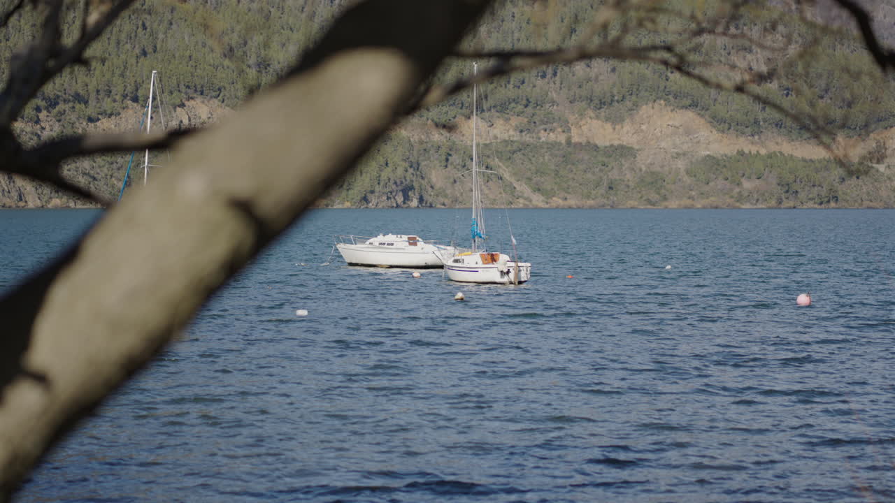 Luxury sports sailboats on Lake Lácar in tourist destination of San Martín de los Andes. Patagonia, Argentina.