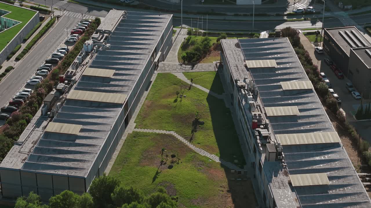 Drone shot of residential complex in the city of Soliva, Italy