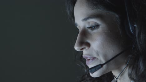 female teleworker working at night