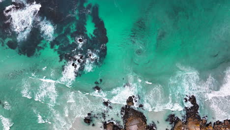 South-Africa-aerial-cinematic-drone-whirlpool-waves-crashing-coastline-Chapman-Peak-Noordhoek-Cape-Town-Hout-Bay-Fish-Hoek-Good-Hope-Simon's-Town-stunning-aqua-deep-blue-water-rugged-rocks-up-motion