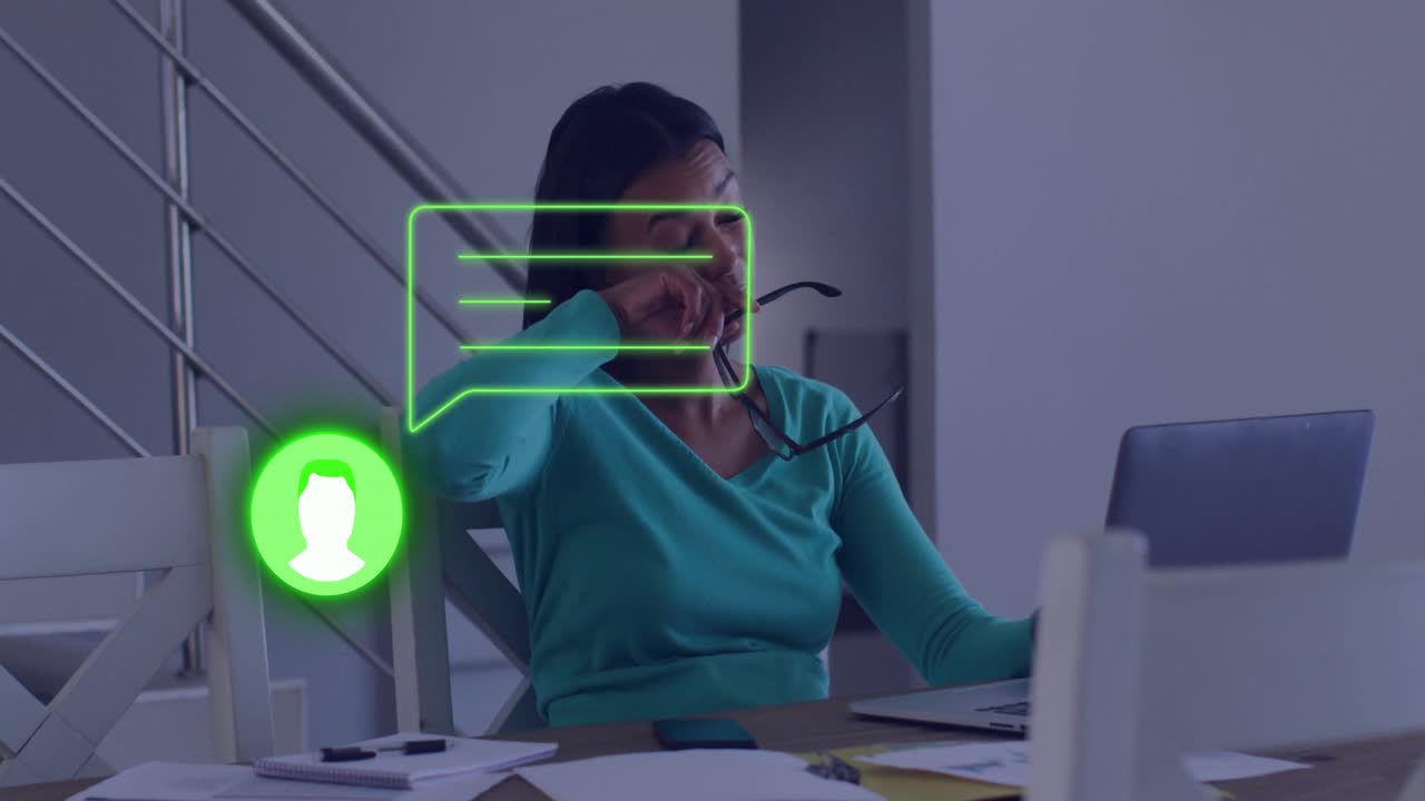 Woman at desk rubbing eyes with message notification animation over her