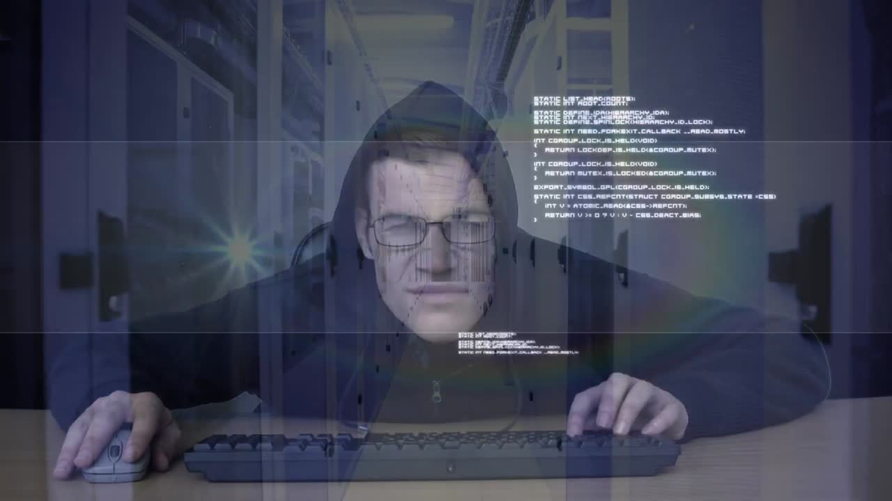 Animation of hooded man hacking a computer