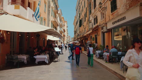 bustling pedestrian street with outdoor cafes and historic architecture in a european city
