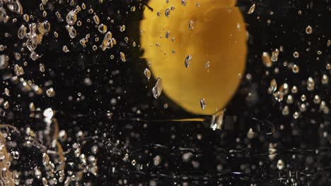 lemon is moving around in liquid very slowly