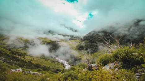 time lapse footage of moving clouds on a himalayan valley