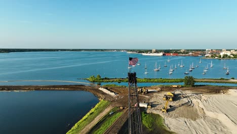 drone aerial - still of an american flag in the breeze