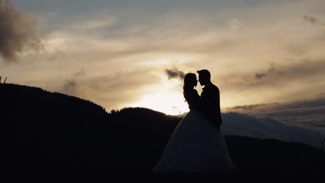 romantic couple silhouette at sunset