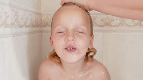 little girl having evening shower