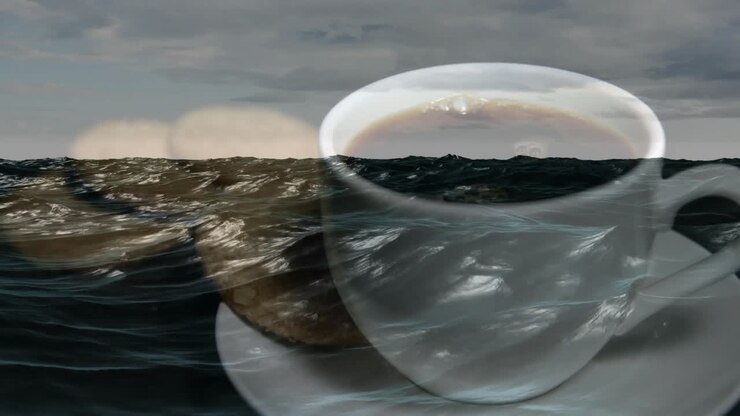 Surreal coffee cup merging with ocean waves, showing ceramic saucer and cookies in double-exposure