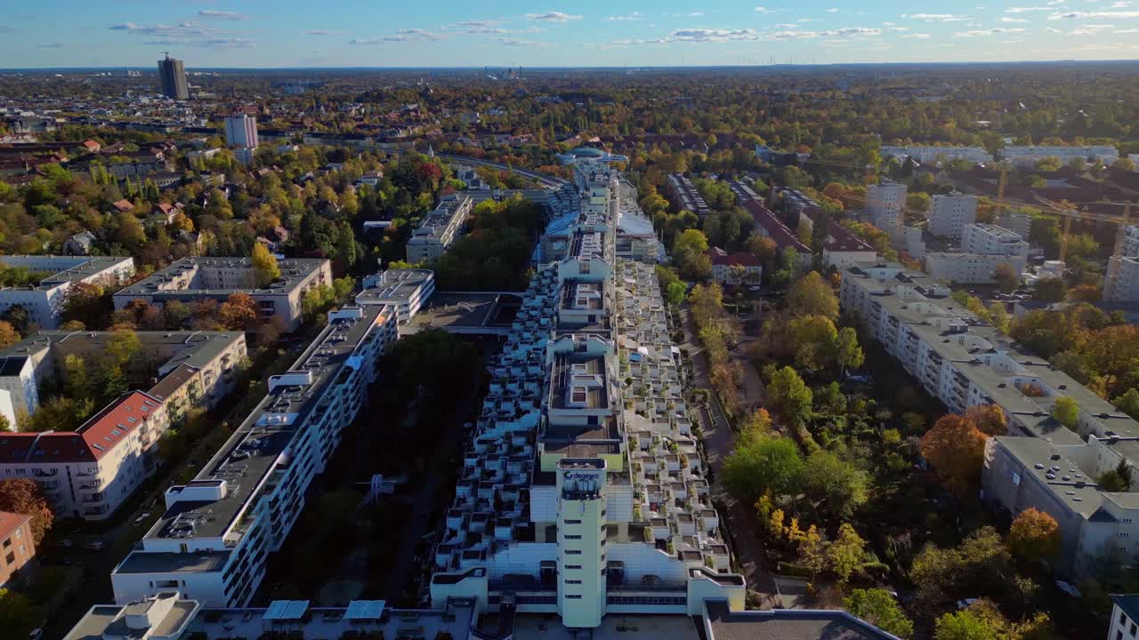 gettow poor slum residential buildings Snake highway route Tunnel House and parks in the Charlottenburg Wilmersdorf district. Stunning aerial view flight overflight flyover fly push forward drone