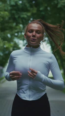 a determined athlete jogging through a lush green path, summoning strength and focus in every step, captured in two dynamic frames