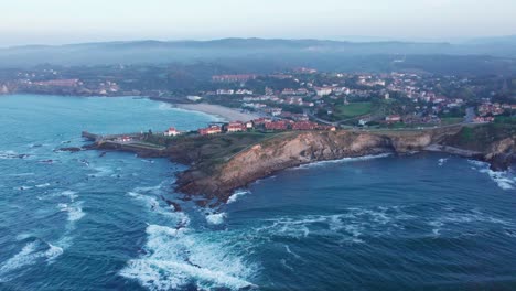 cinematic shot of beautiful cantabria village located on