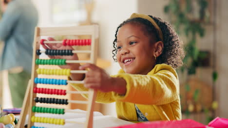 young girl playing with abacus