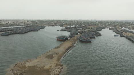 ibrahim hyderi jettydrone flight in ibrahim hyderi jetty many fishing boats in the harbour