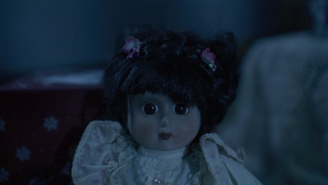 vintage porcelain doll in low light