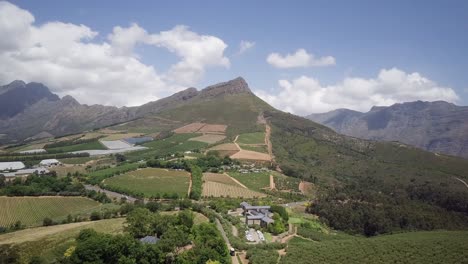 scenic mountains and winery in constantia, cape town, south africa - aerial shot