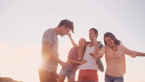 Happy-friends-doing-barbecue-together