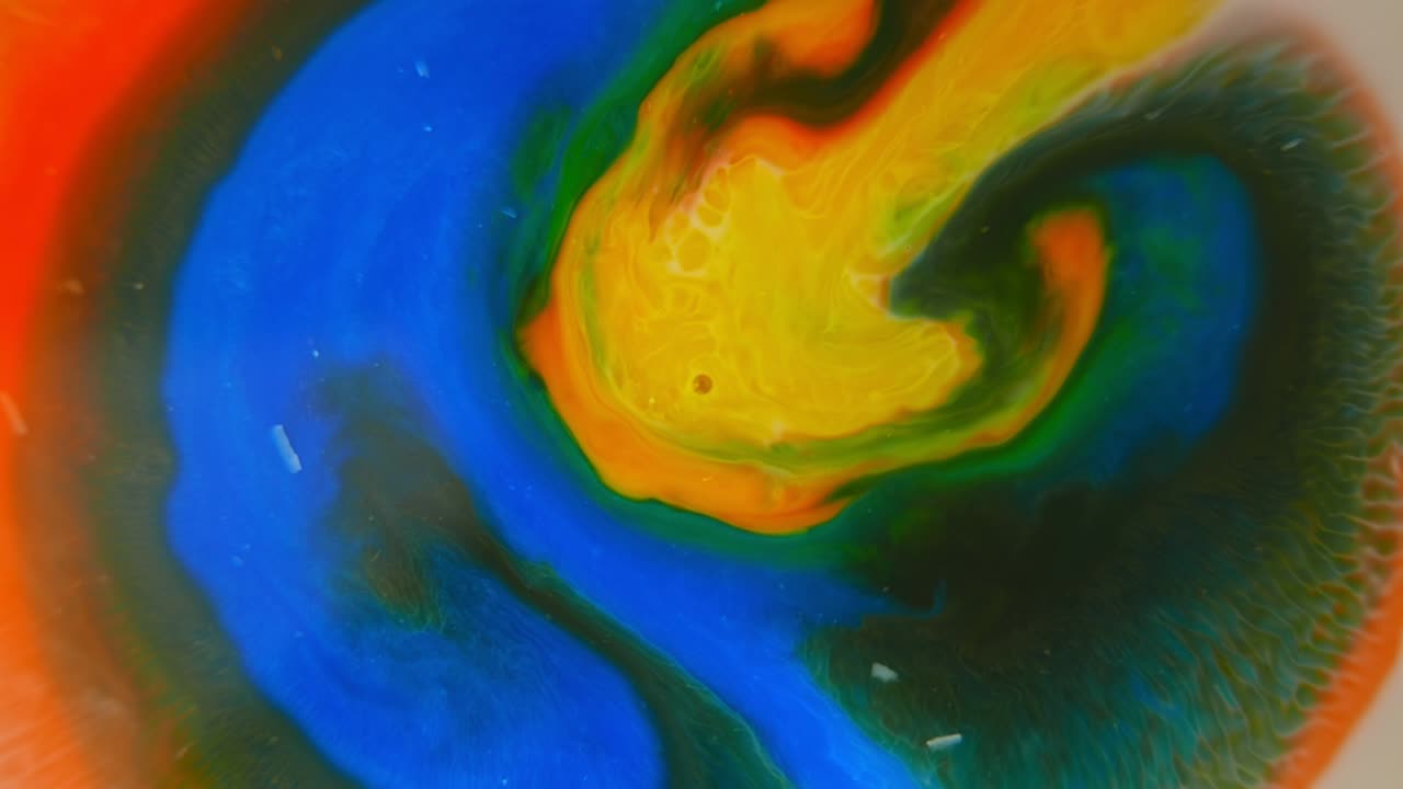 mezcla de colores de pinturas, fondo abstracto de formas morphing. increíbles imágenes en movimiento creadas por tintes giratorios.