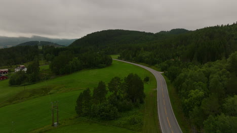 Scenic-Highway-On-The-Green-Lush-Mountains-Near-West-Coast,-Norway