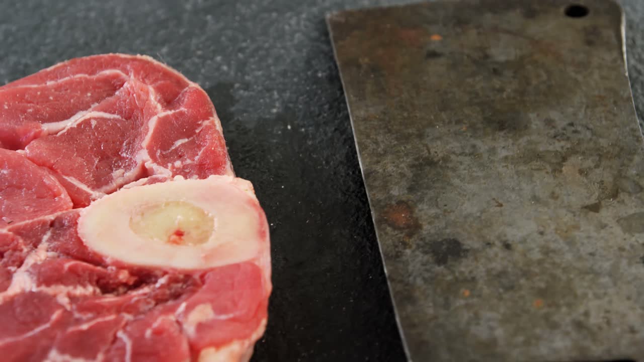 Meat chop and cleaver on the board
