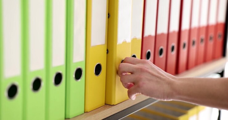Exploring the vibrant world of colorful file organization in a sunny office setting