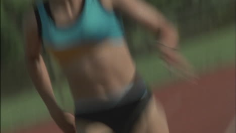 a young woman runs a race