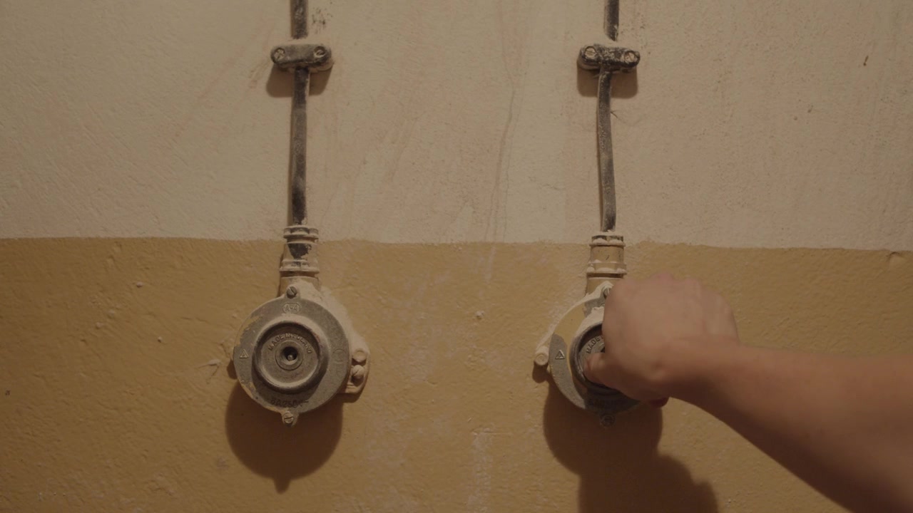 Switching Light On and Off With Old Dusty Light Switch in Old War Shelter Cinematic 4K