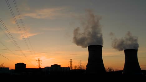 sunset behind a nuclear power plant 1